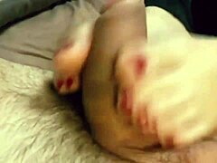 Stepbrother gets a footjob from his step-sister while their mom is away