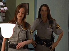 Nikki Fritz and Kira Reed star in a steamy scene featuring hot cops and an orgy